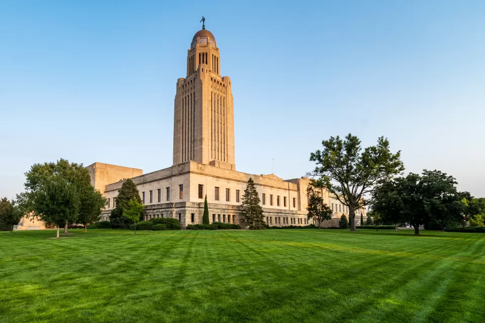 Nebraska capitol building against a blue sky